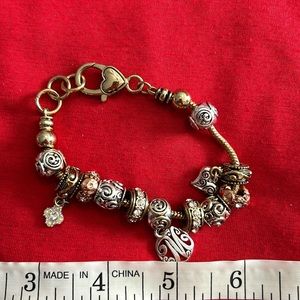 Capricorn charm bracelet. “M” initial charm